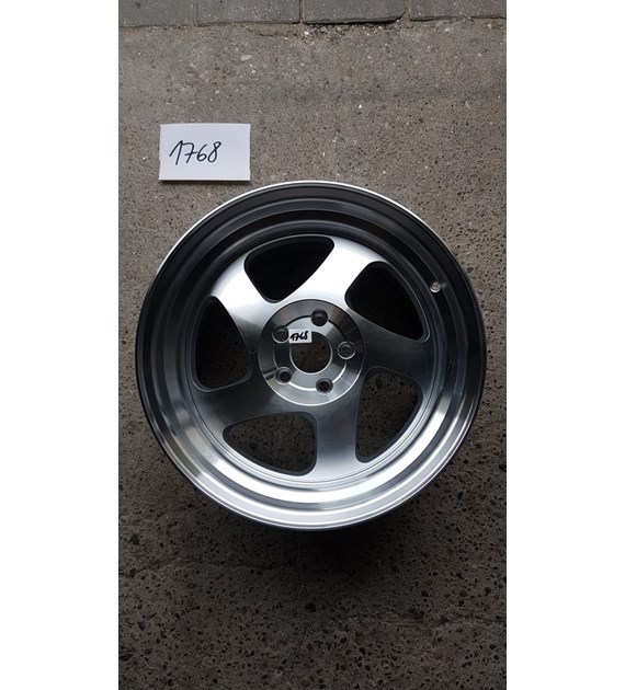 USED JR15 16x9 ET20 Blank Silver Machined