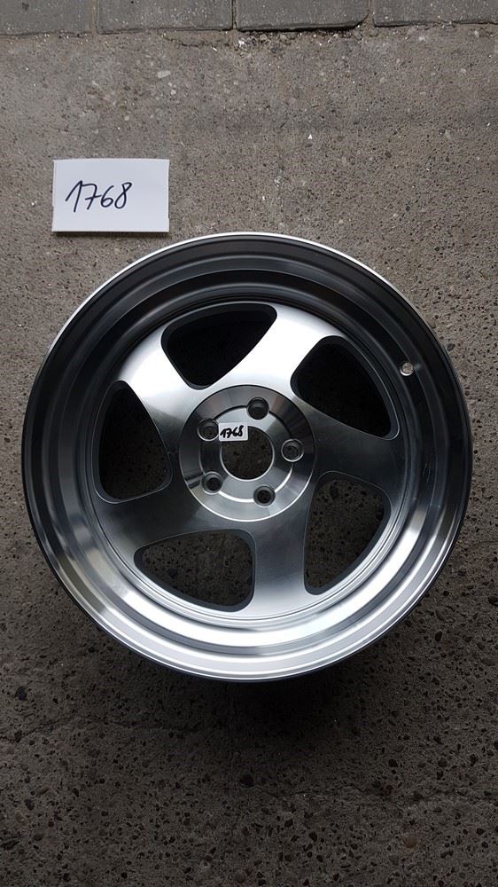 USED JR15 16x9 ET20 Blank Silver Machined